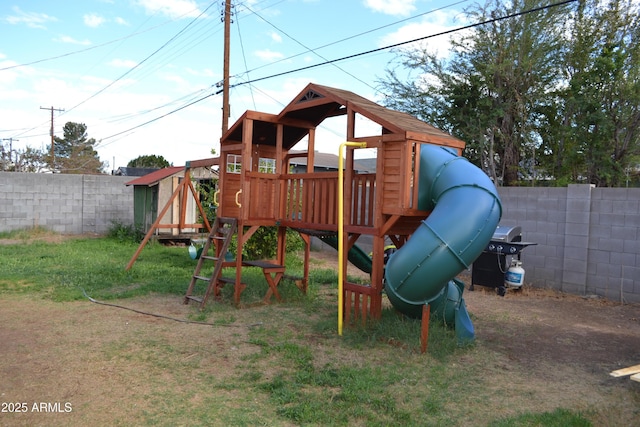 view of play area with a fenced backyard