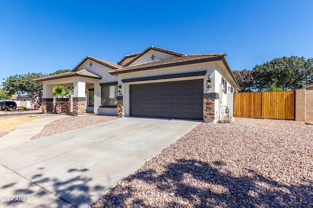 view of front of home with a garage