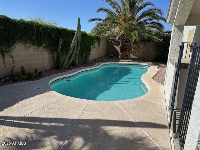 21192 N 80th Ln, Peoria, AZ 85382 - view of swimming pool with a fenced backyard and a patio