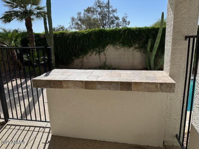 21192 N 80th Ln, Peoria, AZ 85382 - view of patio featuring a balcony and fence