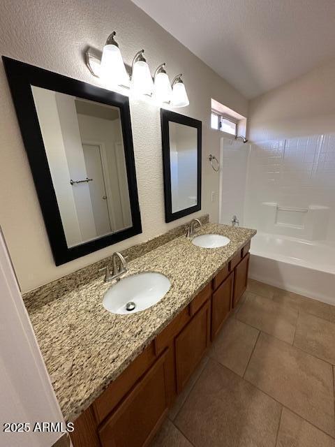 21192 N 80th Ln, Peoria, AZ 85382 - bathroom with  shower combination, double vanity, and tile patterned flooring