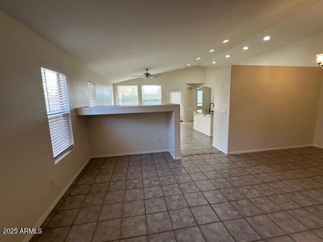 21192 N 80th Ln, Peoria, AZ 85382 - empty room with recessed lighting, a ceiling fan, vaulted ceiling, and baseboards