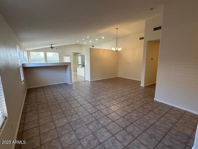 21192 N 80th Ln, Peoria, AZ 85382 - empty room featuring vaulted ceiling, a chandelier, a ceiling fan, and recessed lighting