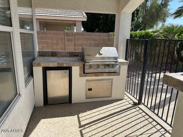 21192 N 80th Ln, Peoria, AZ 85382 - view of patio / terrace with a grill, area for grilling, and fence