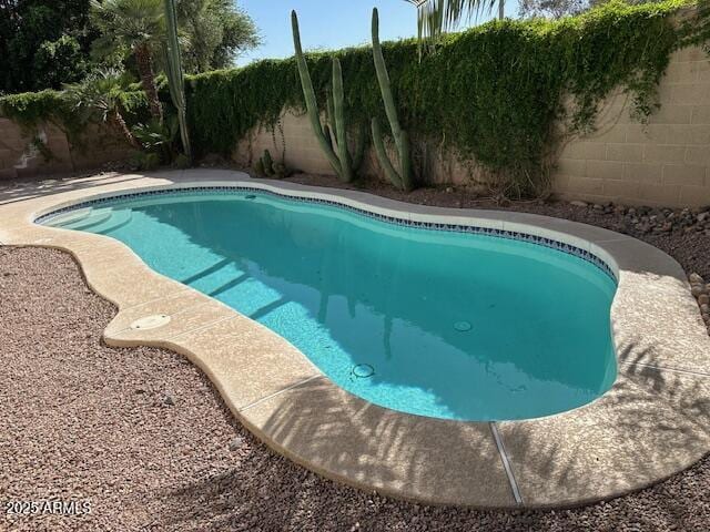 21192 N 80th Ln, Peoria, AZ 85382 - view of pool with a fenced backyard
