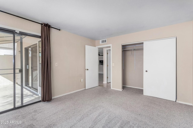 unfurnished bedroom featuring visible vents, baseboards, access to outside, a closet, and carpet