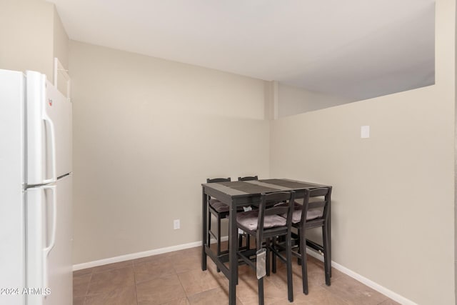 view of tiled dining space