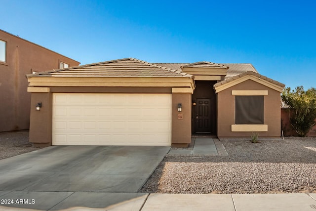 view of front of home with a garage