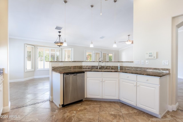 kitchen featuring a sink, crown molding, dishwasher, and dark stone counters