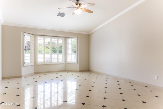empty room with crown molding, vaulted ceiling, baseboards, visible vents, and a ceiling fan