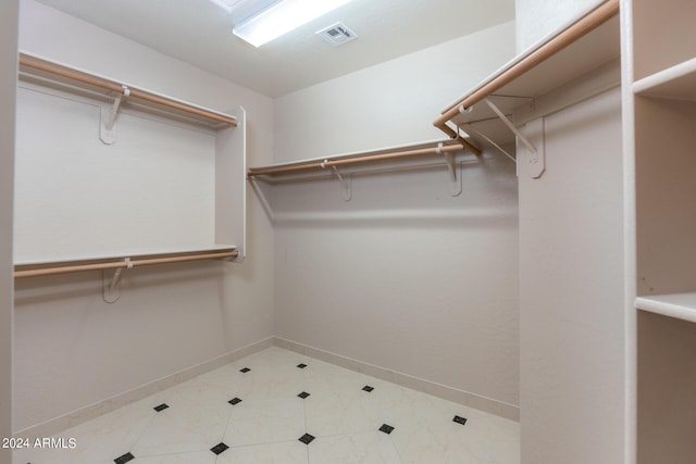 spacious closet with visible vents
