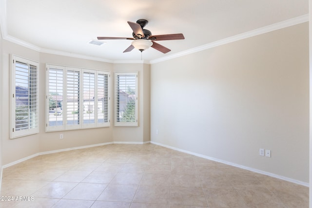 empty room with crown molding, light tile patterned floors, and ceiling fan