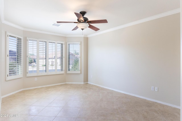 unfurnished room with crown molding, light tile patterned floors, baseboards, ceiling fan, and visible vents