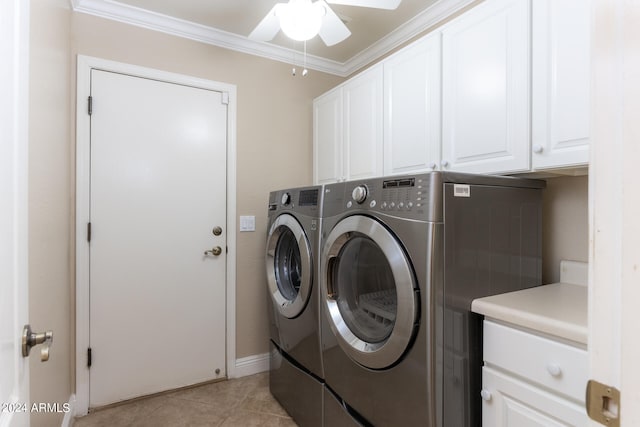 washroom featuring cabinets, washing machine and clothes dryer, light tile patterned floors, crown molding, and ceiling fan