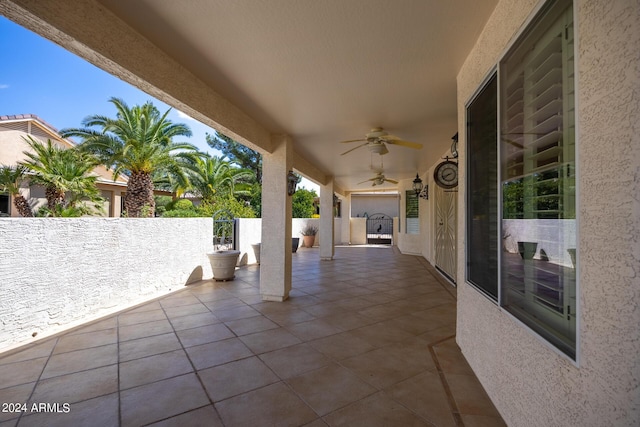 view of patio featuring ceiling fan