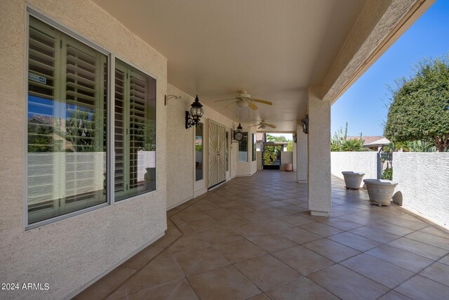 view of patio / terrace featuring ceiling fan