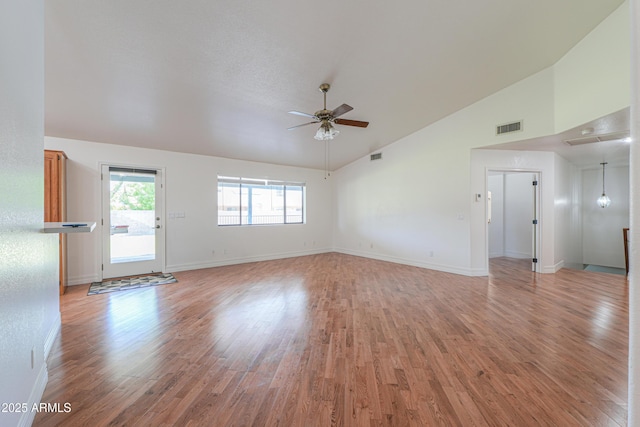 238 W Myrna Ln, Tempe, AZ 85284 - unfurnished living room featuring ceiling fan, light wood-style floors, and high vaulted ceiling