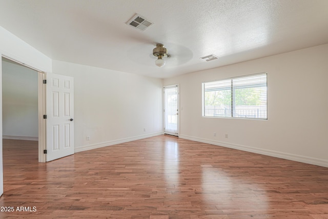 238 W Myrna Ln, Tempe, AZ 85284 - spare room with ceiling fan and wood finished floors