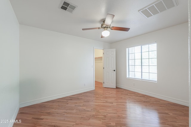 238 W Myrna Ln, Tempe, AZ 85284 - unfurnished room featuring light wood-style floors and a ceiling fan