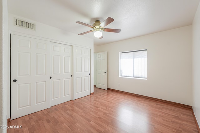 238 W Myrna Ln, Tempe, AZ 85284 - unfurnished bedroom with light wood finished floors, a closet, and ceiling fan