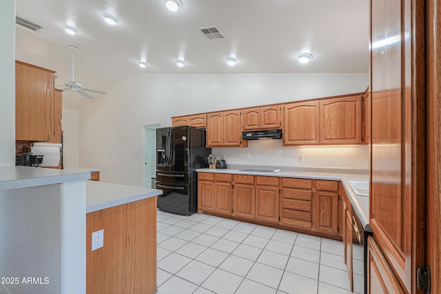 238 W Myrna Ln, Tempe, AZ 85284 - kitchen with black refrigerator with ice dispenser, under cabinet range hood, lofted ceiling, light countertops, and light tile patterned flooring