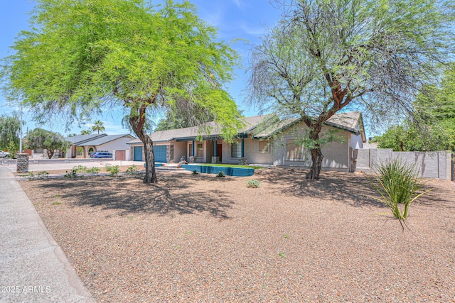 238 W Myrna Ln, Tempe, AZ 85284 - ranch-style house with covered porch, driveway, and an attached garage