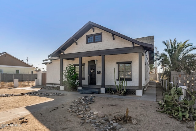 view of front of home featuring covered porch