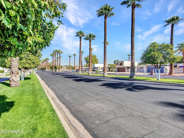 view of street featuring curbs