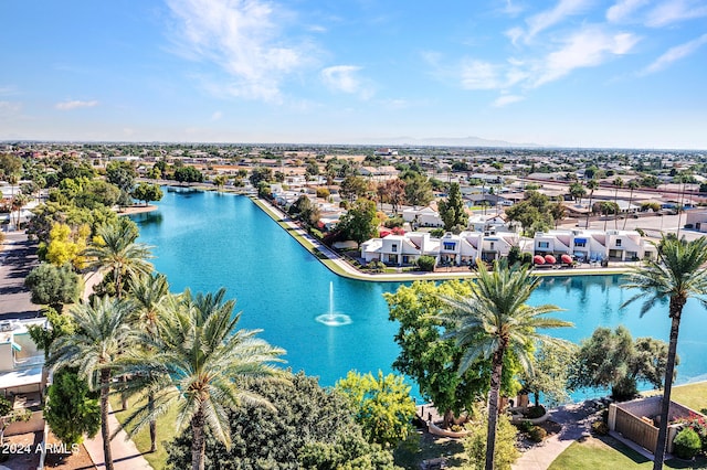birds eye view of property featuring a residential view and a water and mountain view