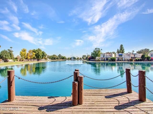 view of dock with a water view