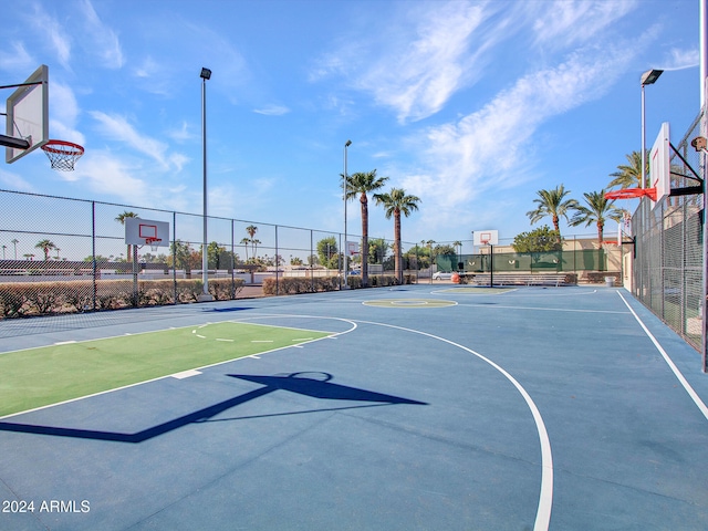 view of sport court featuring fence and community basketball court