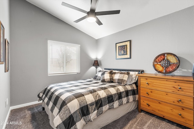 carpeted bedroom featuring vaulted ceiling and ceiling fan