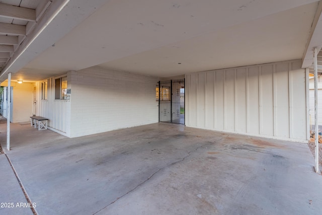 garage featuring a carport