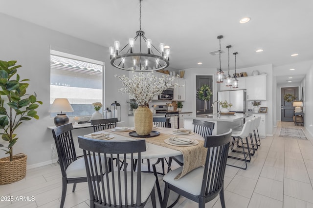 dining space featuring baseboards, visible vents, recessed lighting, and a notable chandelier