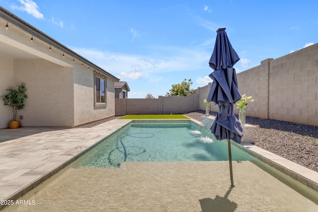 view of swimming pool featuring a patio, a fenced in pool, and a fenced backyard