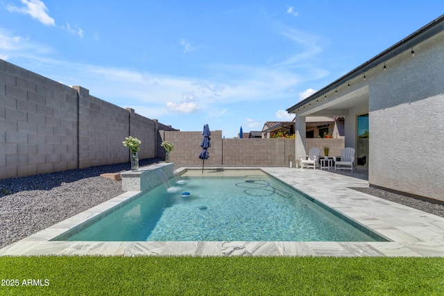view of swimming pool with a fenced in pool, a fenced backyard, and a patio area