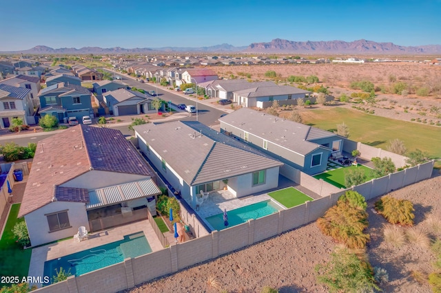 bird's eye view featuring a residential view and a mountain view