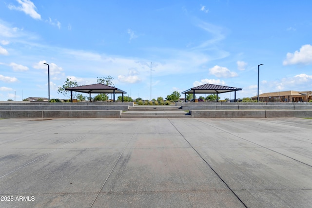 view of car parking with a gazebo and a carport