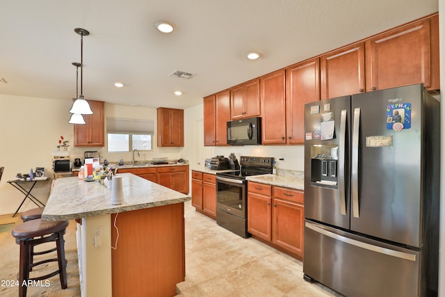 kitchen featuring hanging light fixtures, a breakfast bar area, range with electric cooktop, stainless steel refrigerator with ice dispenser, and sink