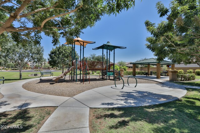 view of jungle gym featuring a yard and a gazebo