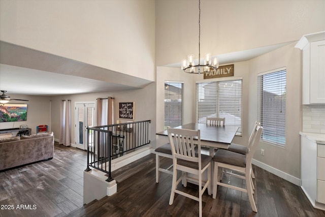19002 N 25th Pl, Phoenix, AZ 85050 - dining room with a chandelier, dark wood finished floors, a ceiling fan, and a high ceiling
