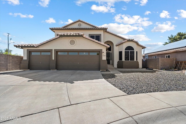 19002 N 25th Pl, Phoenix, AZ 85050 - mediterranean / spanish-style home with driveway, stucco siding, and an attached garage