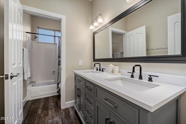 19002 N 25th Pl, Phoenix, AZ 85050 - bathroom with wood finished floors, double vanity, and shower / bath combo