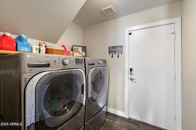 19002 N 25th Pl, Phoenix, AZ 85050 - laundry area with separate washer and dryer, dark wood-style floors, and a textured ceiling