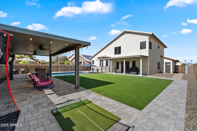 19002 N 25th Pl, Phoenix, AZ 85050 - fenced backyard featuring ceiling fan and a patio