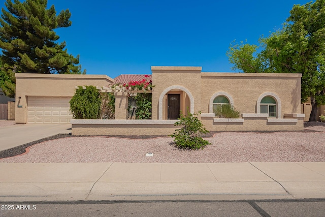 400 W Crofton St, Chandler, AZ 85225 - mediterranean / spanish-style house with stucco siding, concrete driveway, and a garage