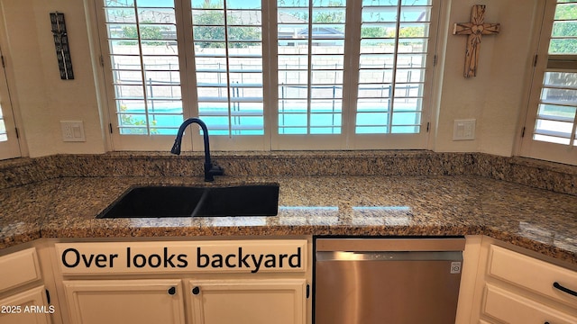 400 W Crofton St, Chandler, AZ 85225 - kitchen featuring stainless steel dishwasher, white cabinets, and dark stone counters