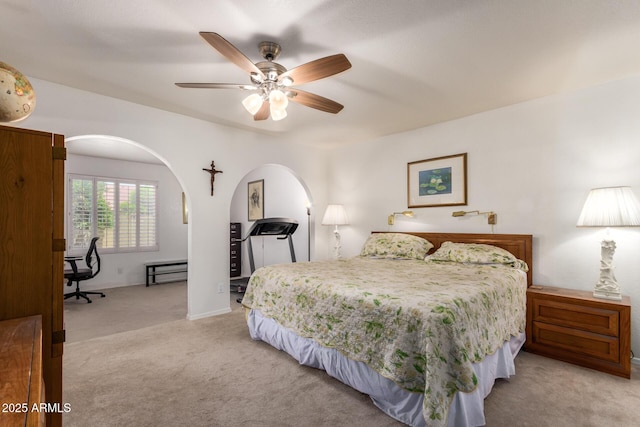 400 W Crofton St, Chandler, AZ 85225 - bedroom with light colored carpet, arched walkways, and a ceiling fan