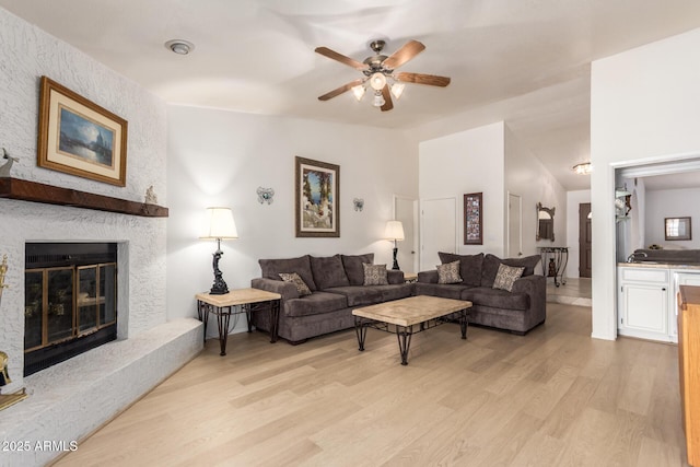 400 W Crofton St, Chandler, AZ 85225 - living area featuring ceiling fan, light wood-type flooring, and a fireplace