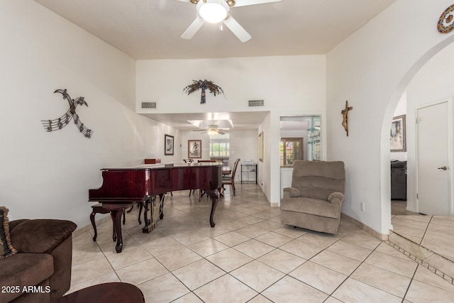 400 W Crofton St, Chandler, AZ 85225 - living area with ceiling fan, arched walkways, and light tile patterned flooring